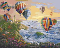 Полет воздушных шаров над берегом моря